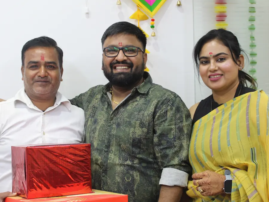 The team celebrating a festival in the office