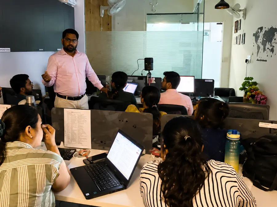 An internal training session running in the office